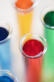 Multi-colored liquids in vials.