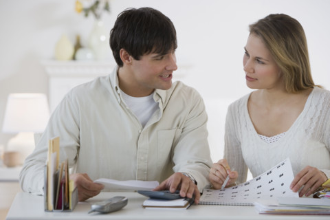 Couple paying bills.