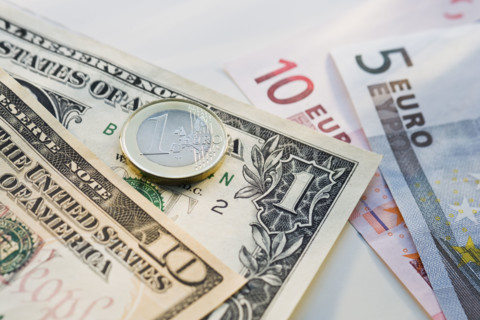 Close up of us dollars and euros.