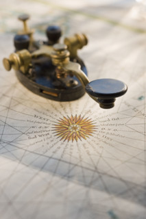 Telegraph key on antique map.