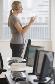 Businesswoman wearing headset.