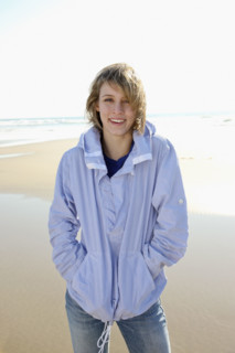 Woman standing on beach. Date : 2008