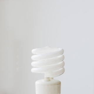 Close up of energy efficient light bulb. Date : 2008