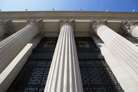 Low angle view of stone columns, New York City, New York, United States. Date : 2008