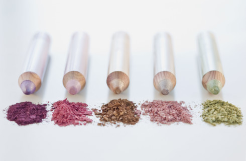 Close up of assorted makeup pencils.