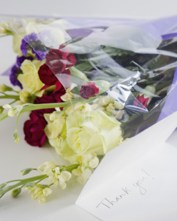 Close up of flower bouquet and note. Date : 2008