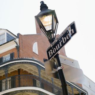 Low angle view of Bourbon Street sign, French Quarter, New Orleans, Louisiana, United States. Date