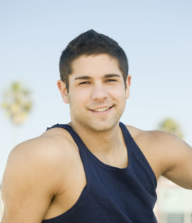 Close up of man wearing tank top. Date : 2008