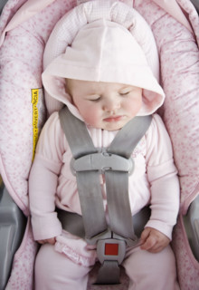 Baby sleeping in car seat. Date : 2008