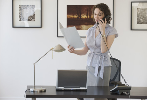 Businesswoman talking on telephone.
