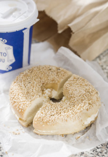Close up of bagel and coffee. Date : 2008