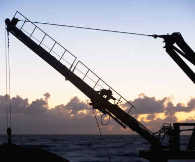 Construction crane in front of water. Date : 2008
