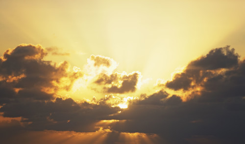 Sun shining through clouds. Date : 2008