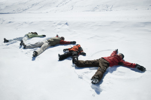 Family making snow angels. Date : 2008