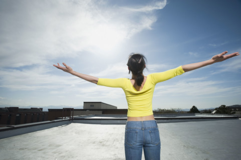 Woman with arm outstretched. Date : 2008