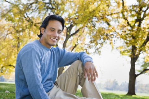 Man sitting in grass. Date : 2008