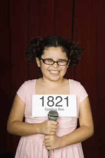 Girl wearing number on stage. Date : 2008