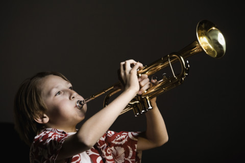Boy playing trumpet. Date : 2008