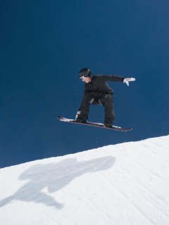 Man on snowboard in air. Date : 2008
