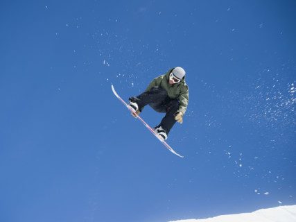 Man on snowboard in air. Date : 2008