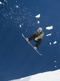 Man on snowboard in air. Date : 2008