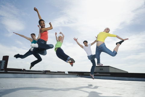Multi-ethnic group performing modern dance. Date : 2008
