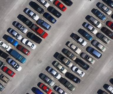 aerial veiw of cars in parking lot. Date : 2008