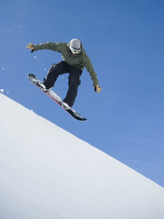Man on snowboard in air. Date : 2008