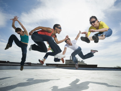 Multi-ethnic group performing modern dance. Date : 2008