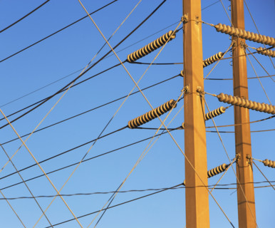 Low angle view of power lines on poles. Date : 2008