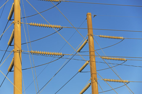 Low angle view of power lines on poles. Date : 2008