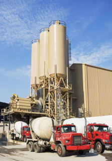 Cement trucks parked at cement plant. Date : 2008