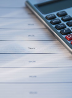 Close up of datebook and calculator. Date : 2008