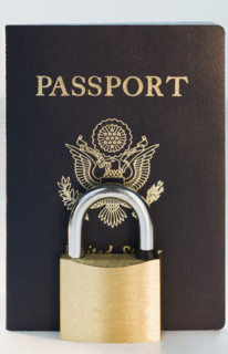 Close up of lock and passport. Date : 2008