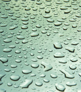 Close up of water droplets on glass. Date : 2008