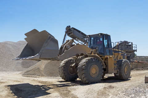 Bucket loader in gravel yard. Date : 2008