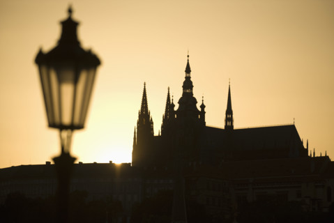 Sunset over silhouetted cathedral.