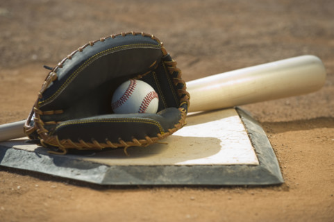 Baseball equipment on home plate.