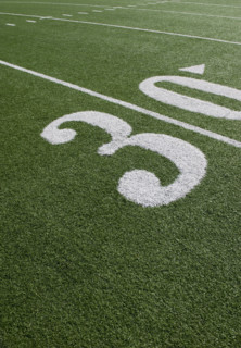 Thirty yard line on football field.