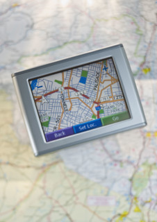 Close up of navigational system and map.