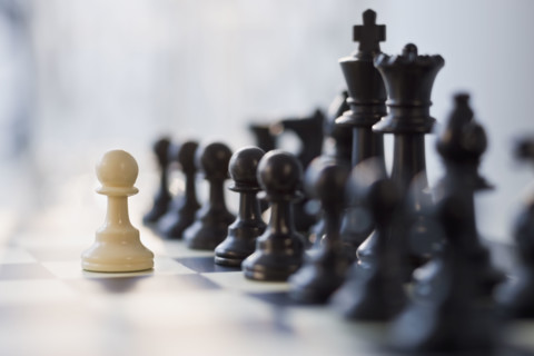 Close up of chess pieces.