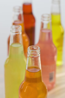 Assorted soda bottles.