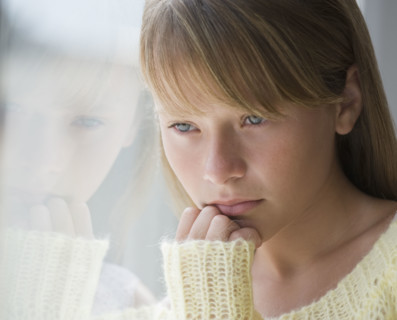 Close up of sad girl.