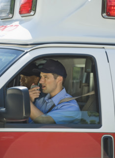 EMT’s driving in ambulance.