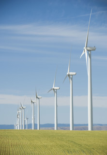 Windmills in a row on wind farm. Date : 2008