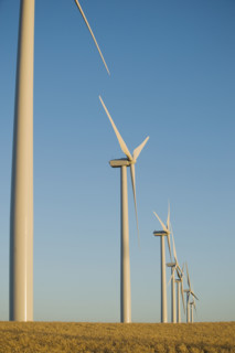 Row of windmills on wind farm. Date : 2008