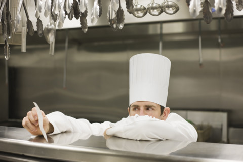 Frustrated chef reading ticket. Date : 2008