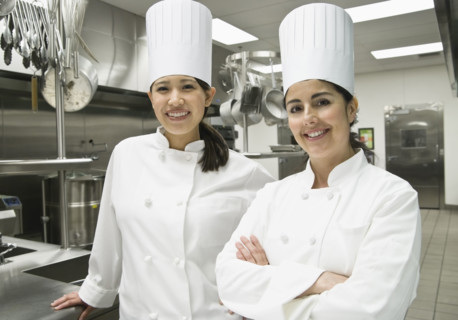 Female chefs posing in kitchen. Date : 2008