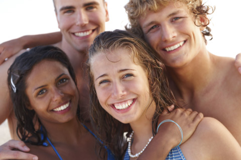 Young couples hugging on beach. Date : 2008