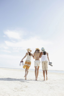Friends walking in beach. Date : 2008